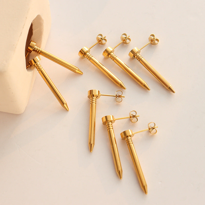 Gold spike stud earrings display